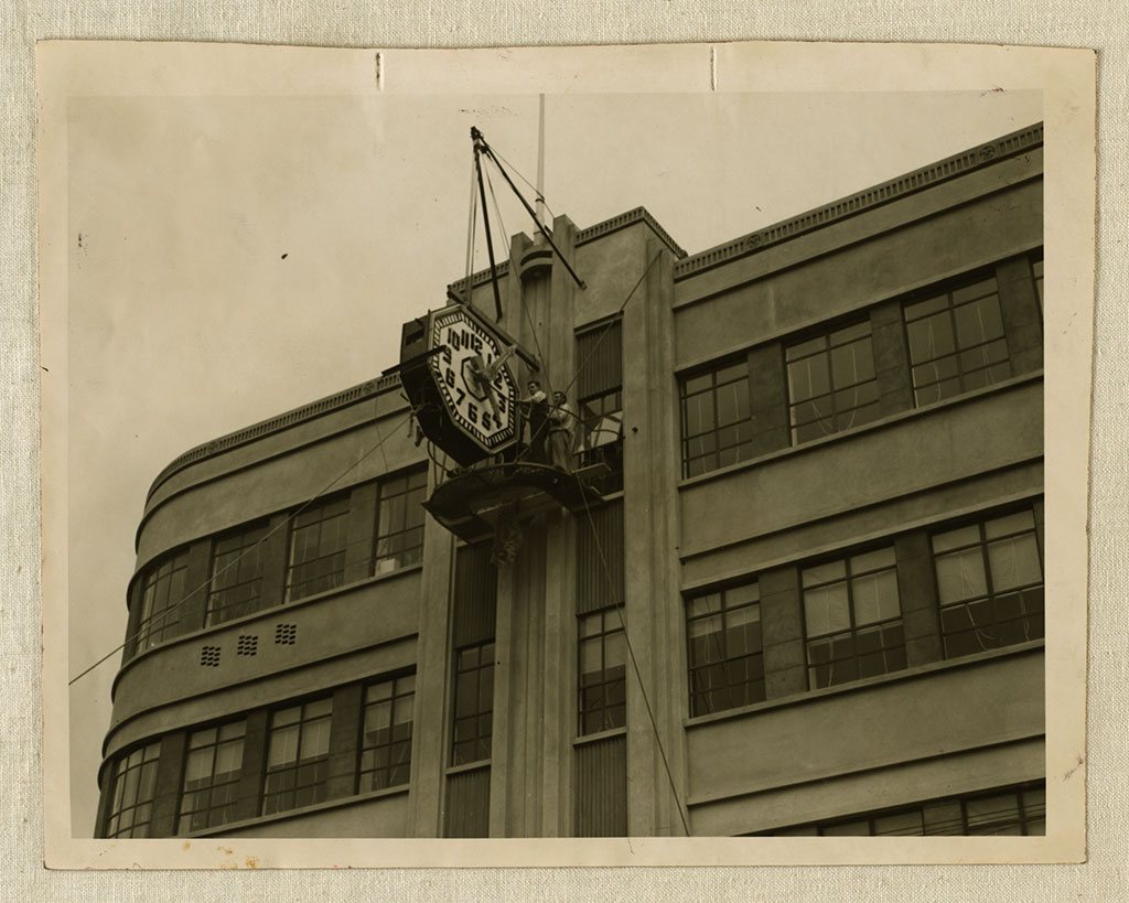 Image of Moving clock into position, new M.E.D building, May 1939 May 1939