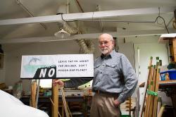 Thumbnail Image of Bruce with one of his protest signs