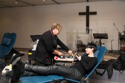 Thumbnail Image of Donating blood at the mobile New Zealand Blood Service unit