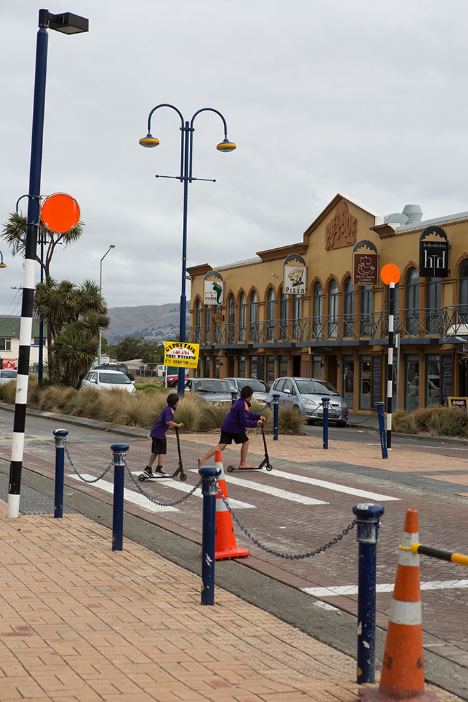 Image of Children on scooters on Marine Parade pedestrian crossing, New Brighton. Thursday, 17 March 2016