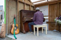 Thumbnail Image of Playing piano at The Commons, a Gap Filler project