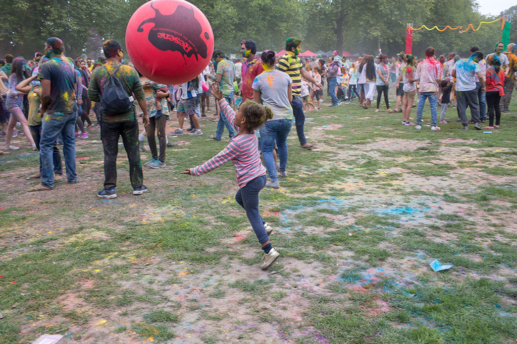 Image of Child chasing a balloon at the Holi Festival, Hagley Park. Saturday, 17 March 2018