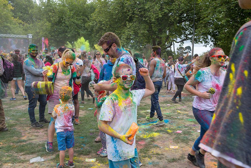 Image of Child throwing colours at the Holi Festival, Hagley Park. Saturday, 17 March 2018