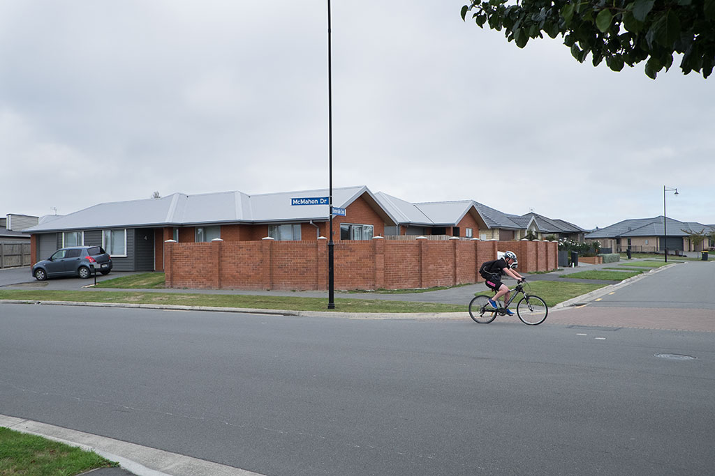 Image of Cyclist in Aidanfield subdivision, corner of McMahon Drive and Somerville Crescent. 27-03-15 10.29 a.m.