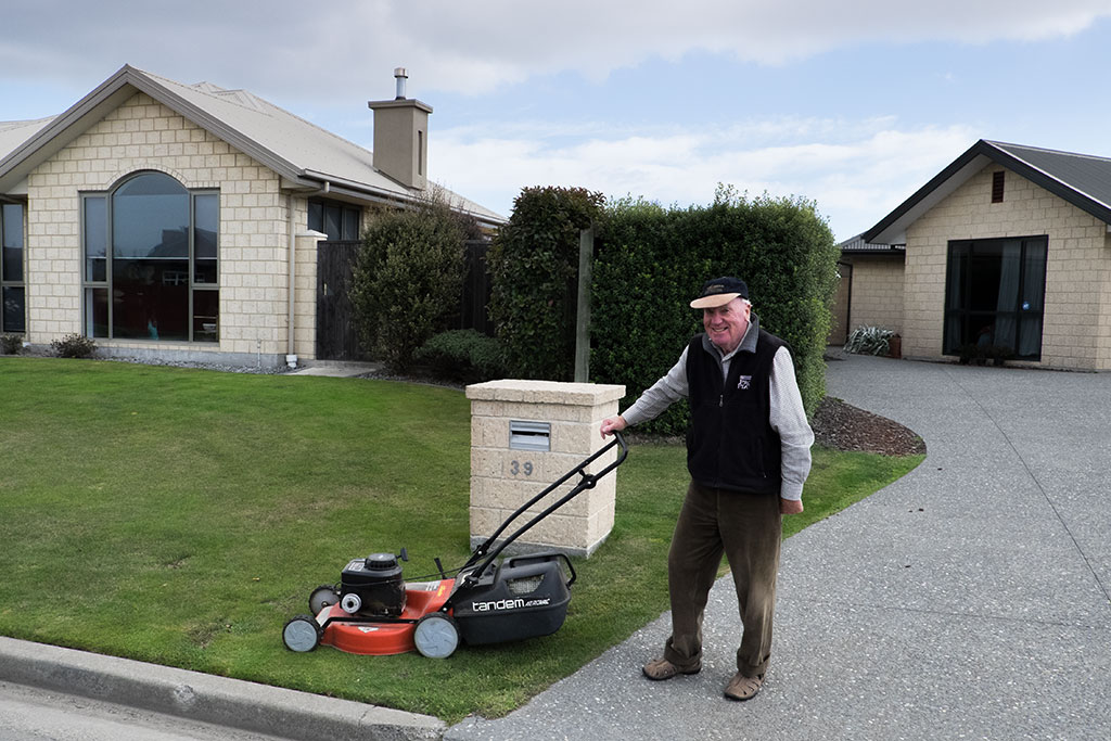 Image of Roger mowing his front lawn, Stallion Avenue. 15-04-2015 11.48 a.m.