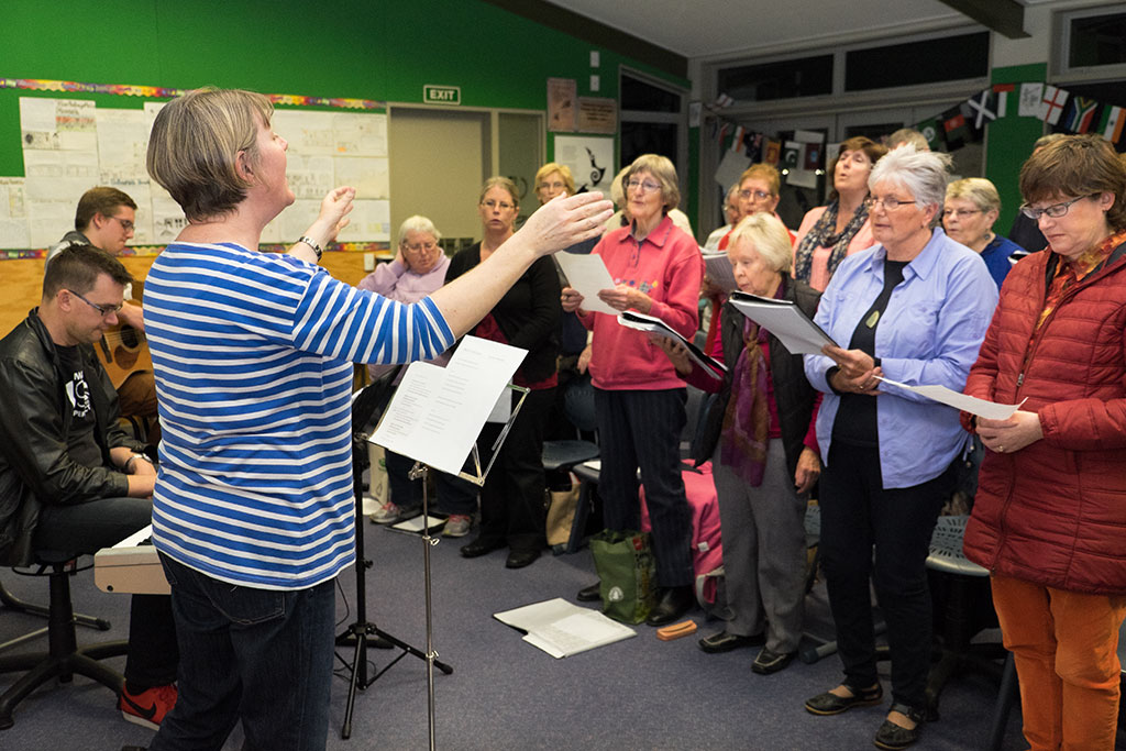 Image of Lesley leads the Halswell Community Choir practise, Aidanfield Christian School, 2 Nash Road. 4-05-2015 8.00 p.m.