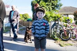 Thumbnail Image of Boy proudly wears the hat from his grandfather's war uniform