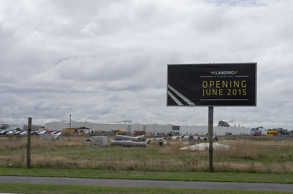 Image of Billboard for "The Landing" shopping centre, Wigram Skies. 23-03-2015 1:45 p.m.