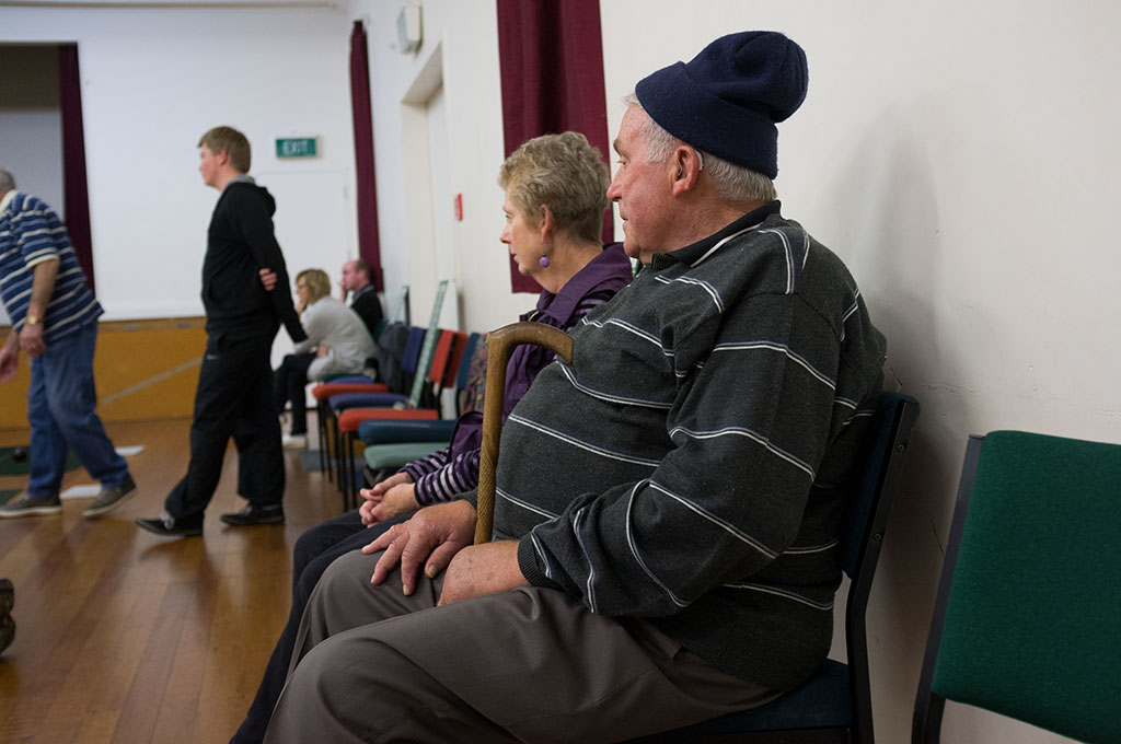 Image of Kelvin watches a game. Halswell Indoor Bowls Club, The Halswell Hall. 20-04-2015 9:52 p.m.