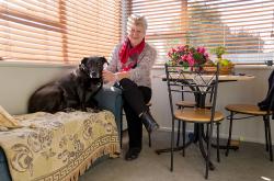 Thumbnail Image of Jill with her black Labrador