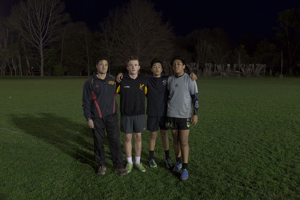 Image of Zach, Ihaia, David, and Malcolm, players and coach of a Halswell Hornets Rugby League Club junior team at a practice before their season final. 4/08/2015 18:20