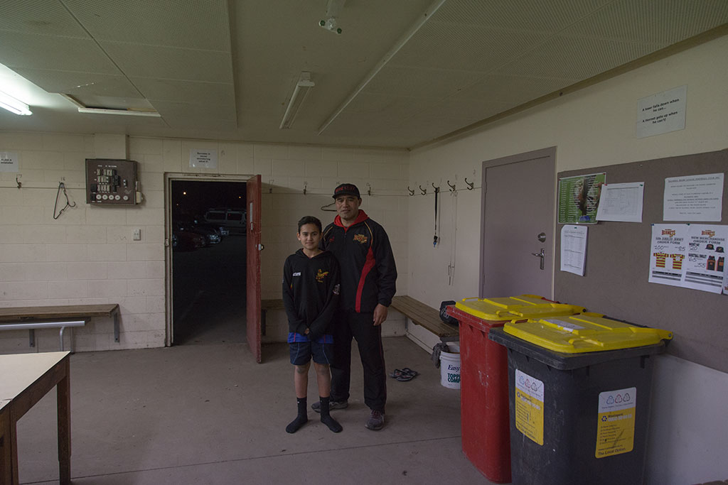 Image of Shane, long time member of the Halswell Hornets Rugby League Club, with his son Ethan, in one of the changing rooms. 4/08/2015 19:02
