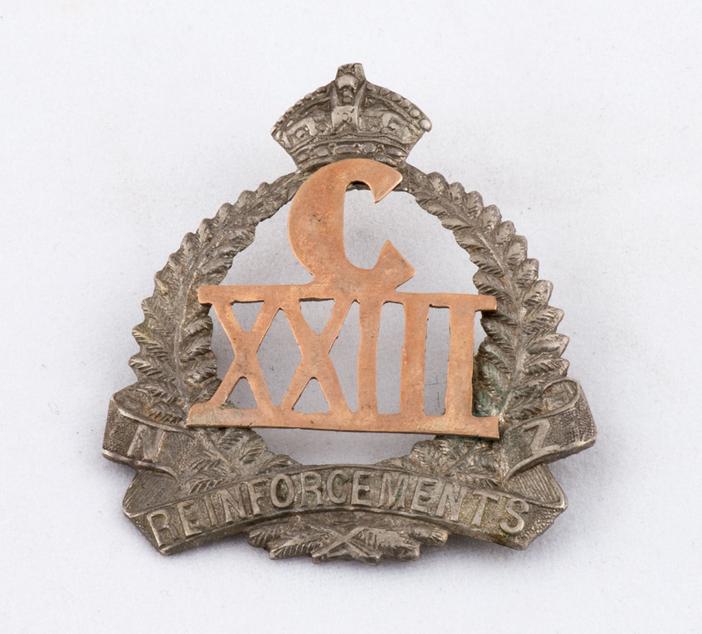Image of Cap badge, 23rd Reinforcements, C Company, N.Z.E.F ca. 1917