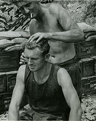 photo from Norman Piersons Korean War collection: "Getting my short back and sides"