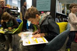 Thumbnail Image of Reading a comic, opening, Ōrauwhata : Bishopdale Library