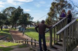Thumbnail Image of Grandfather and his granddaughters enjoy the flying fox
