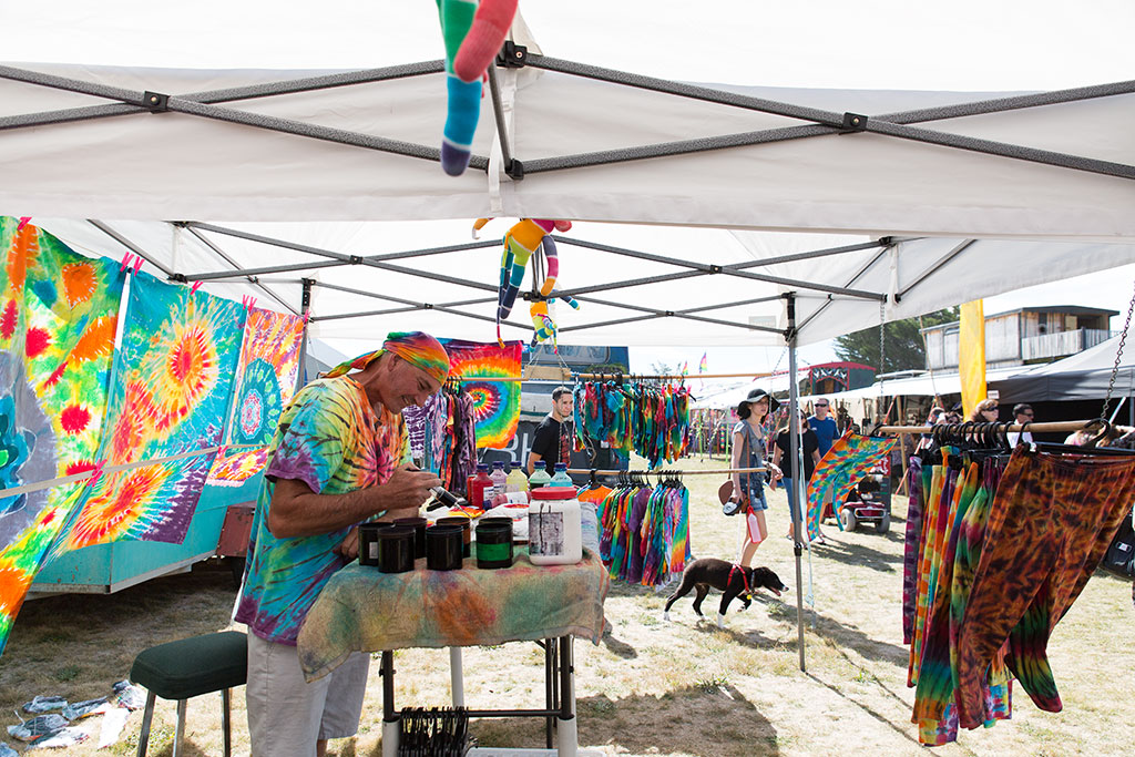Image of Tie-dying t-shirts. Gypsy Fair at the South New Brighton Surf Life Saving Club. 19-03-2016 2:55 p.m.