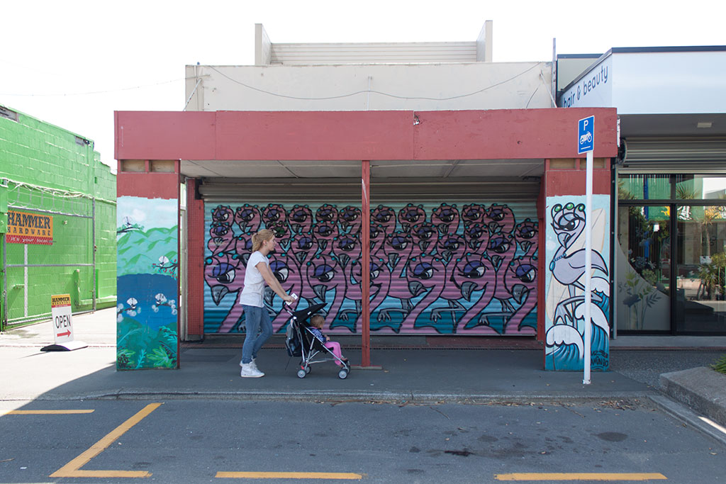 Image of A shopper passes a decorated bus stand, New Brighton Mall. Thursday, 31 March 2016