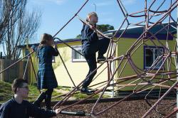 Thumbnail Image of Students play on the playground at South New Brighton School