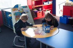 Thumbnail Image of Students working on a puzzle, South New Brighton School