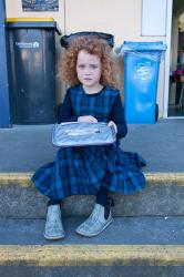 Thumbnail Image of A student eats lunch at South New Brighton school