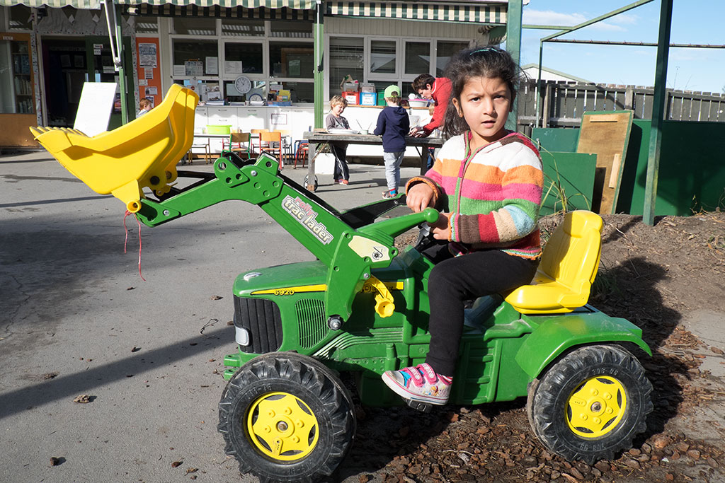Image of Adan plays on the Kindergarten's toy tractor, 134 Wales Street. 18-05-15 11.05 a.m.