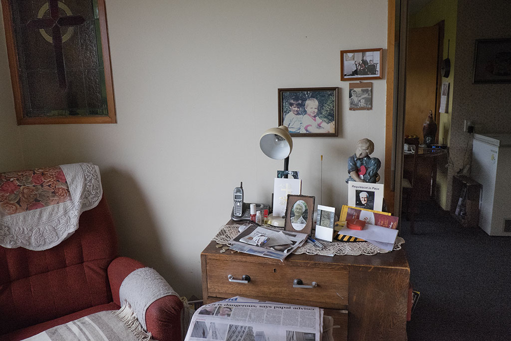 Image of Collection of personal items on a dresser in Patricia's television room. 02-06-15 3.25 p.m.