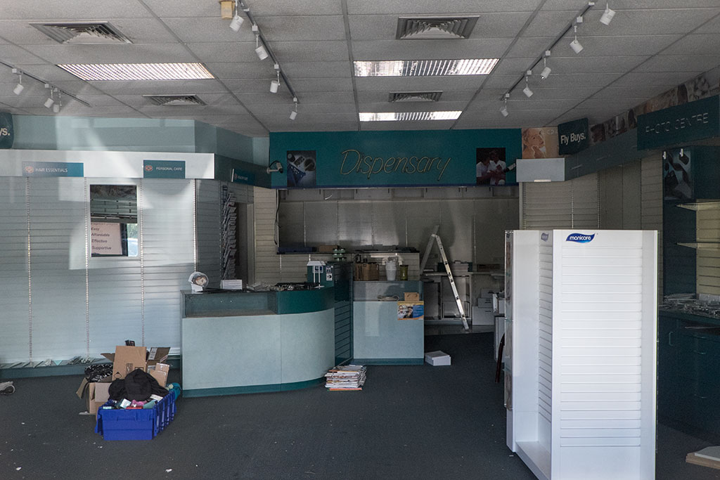 Image of The old Unichem Stanton's Pharmacy being stripped for demolition, 346 Halswell Road. 30-03-15 12.12 p.m.