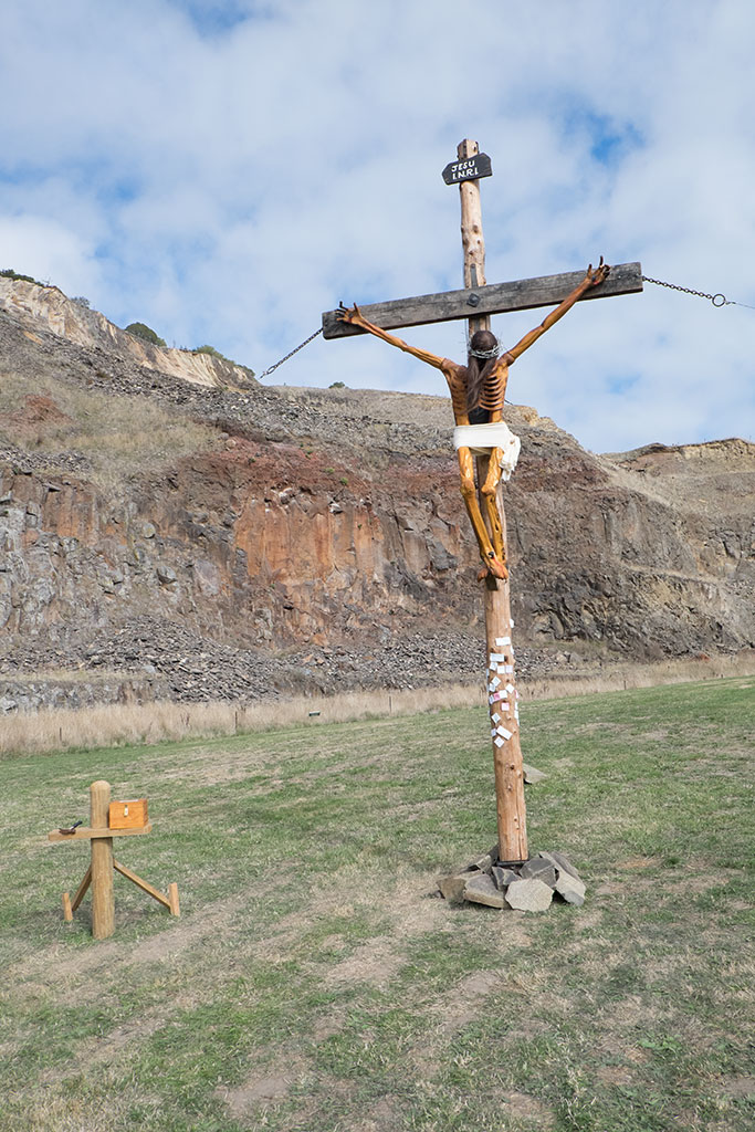 Image of A statue Jesus nailed to a cross at Halswell Quarry Park as part of the Easter celebrations. Halswell Quarry park. 5-04-15 11.23 a.m.