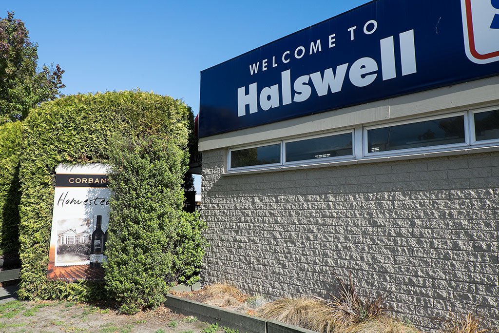 Image of Part of the Halswell Super Liquor sign, Halswell Shopping Centre, 346 Halswell Road. 15-04-15 1.35 p.m.
