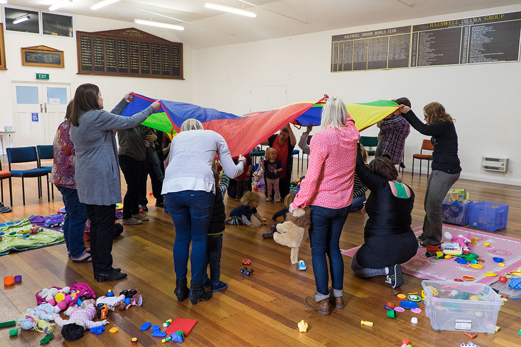 Image of Playing with the parachute at Little Steps, Halswell Community Hall, 450 Halswell Road. 24-04-15 10.54 a.m.