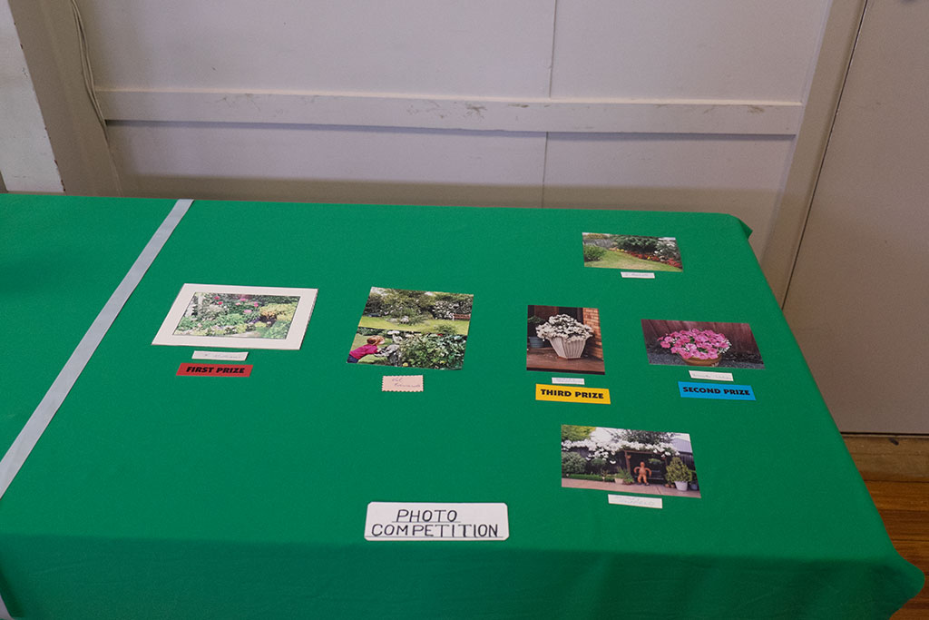 Image of Photo competition table at the Halswell Garden Club prize giving, St Mary's Anglican Church. 12-05-15 1.12 p.m.