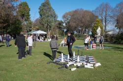 Thumbnail Image of Market goers play with giant board games