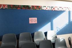 Thumbnail Image of Chairs stacked in the school hall at Oaklands Primary School