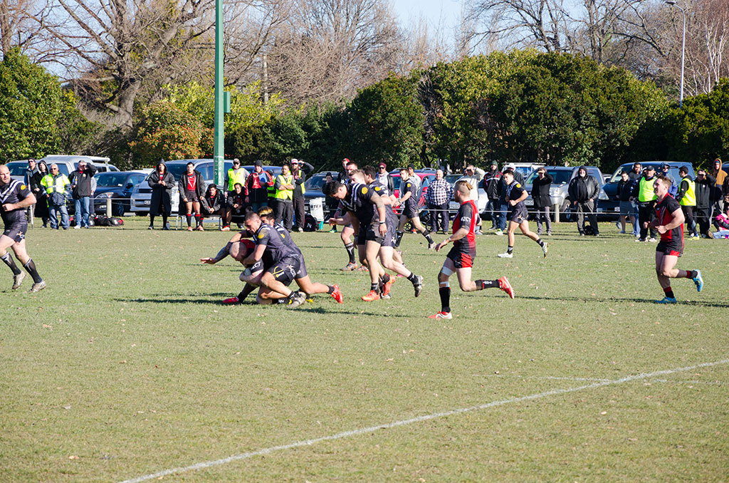 Image of Riccarton Knights (red) play Hornby Panthers (black) at the Halswell Domain rugby field. 25-07-2015 2:34 p.m.