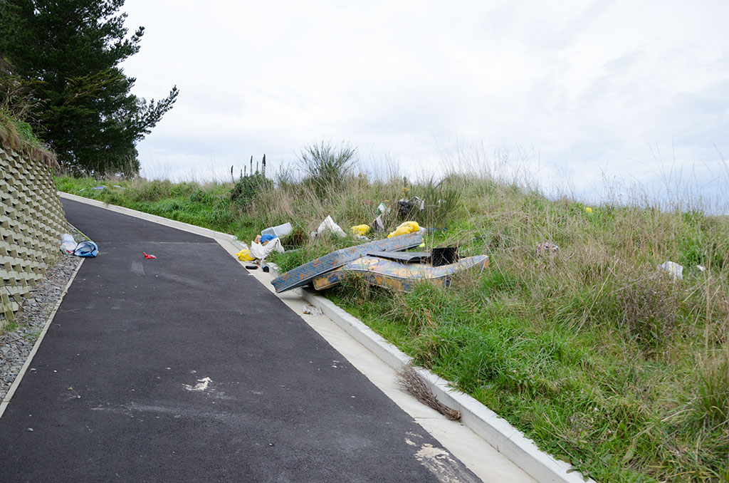 Image of Dumped rubbish next to new driveway in Kennedys Bush. 27-07-2015 3:41 p.m.