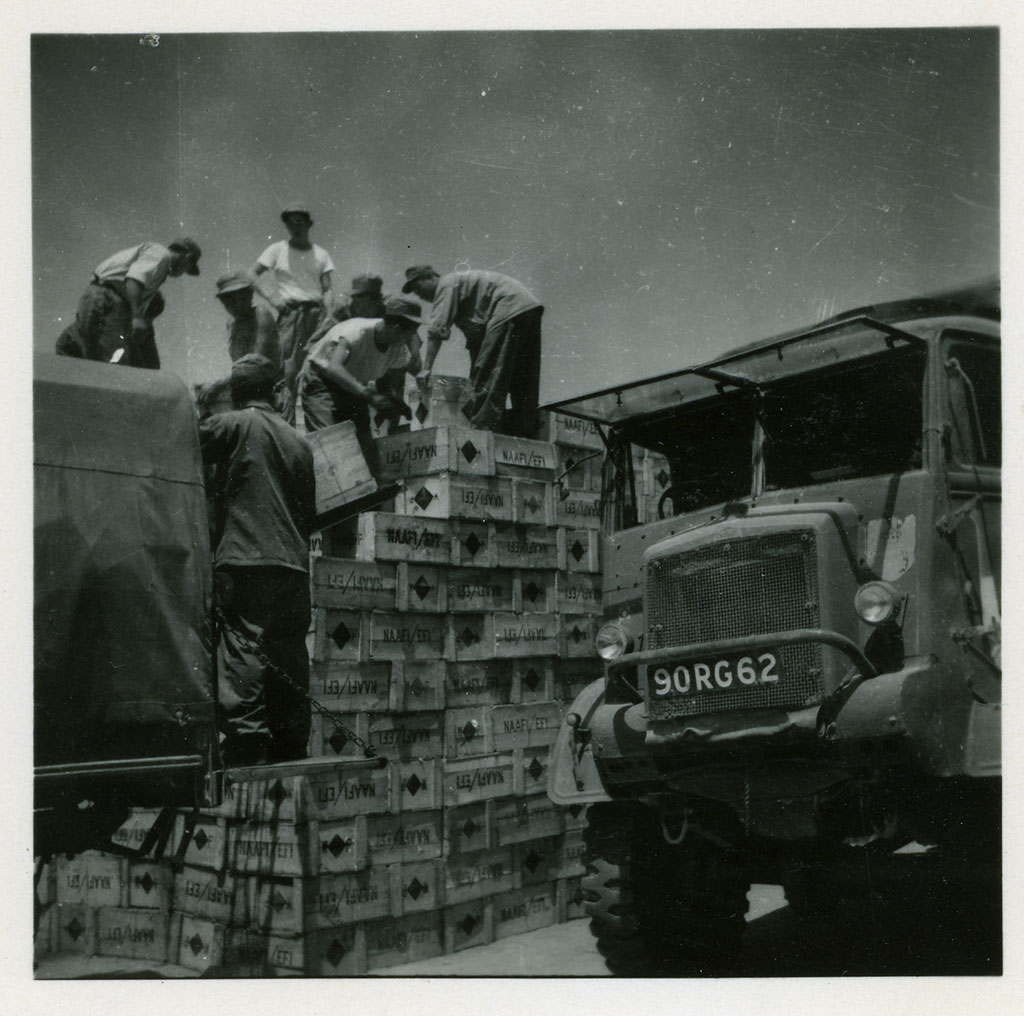 Image of Essential supplies. Beer arriving at Seoul airport. 1951-1952.